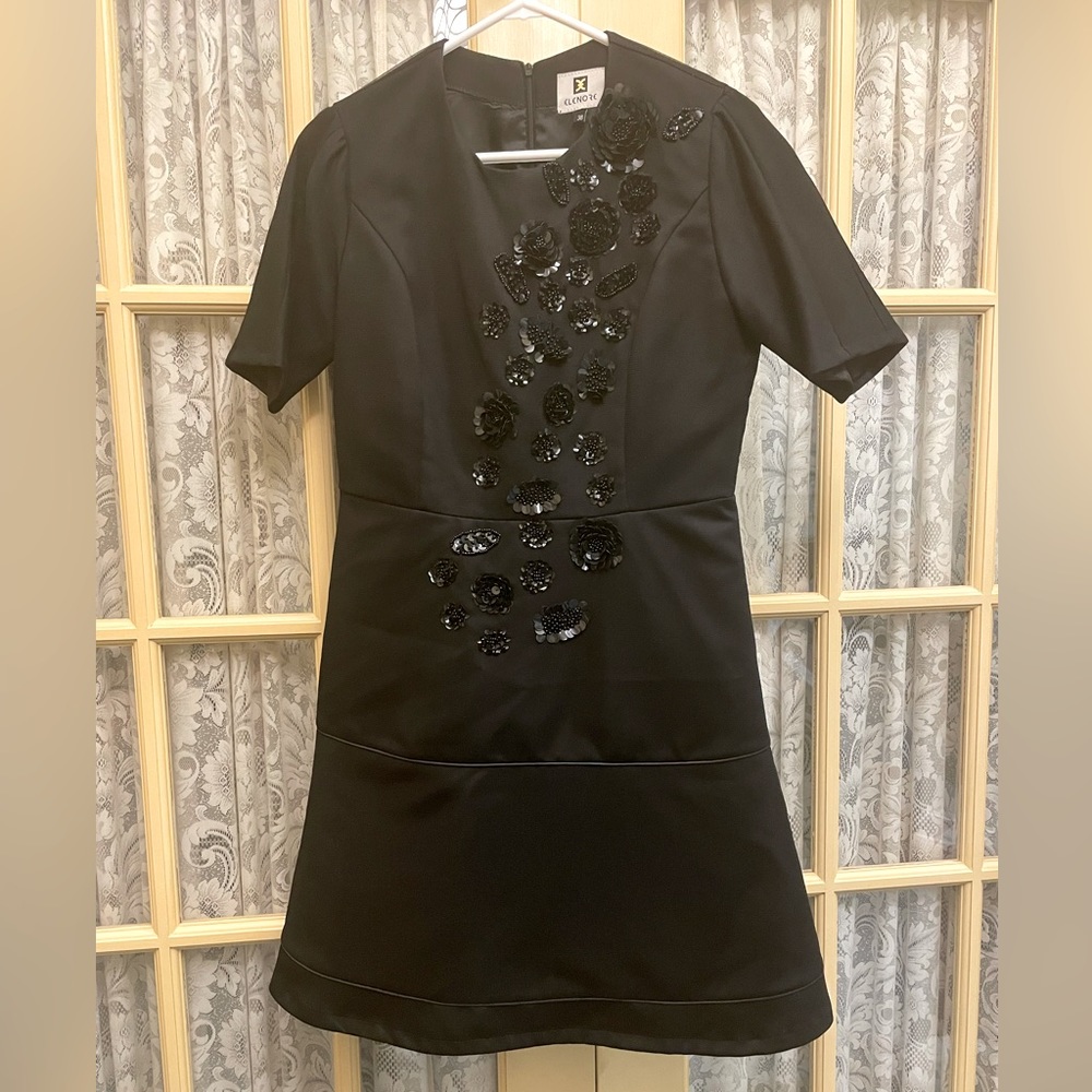Formal black layered dress with flower appliqués. Short sleeve